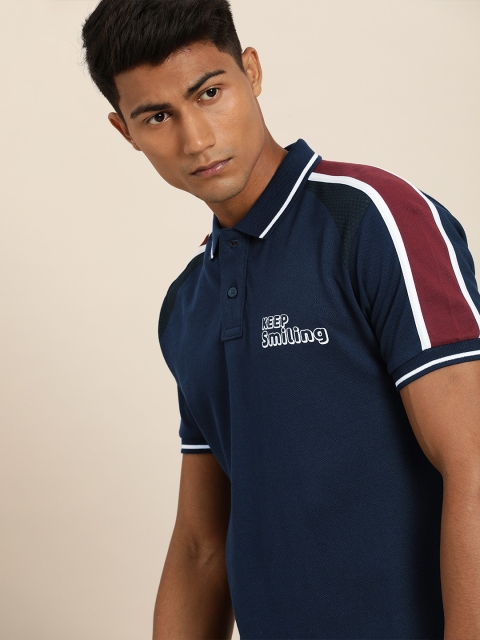 

Moda Rapido Men Navy Blue Solid Polo Collar T-shirt with Printed Detail