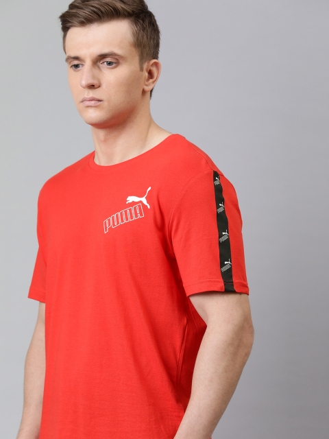 

Puma Men Red AMPLIFIED Solid Round Neck T-shirt with Printed Detail