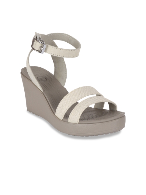 

Crocs Women White Solid Wedge Heels