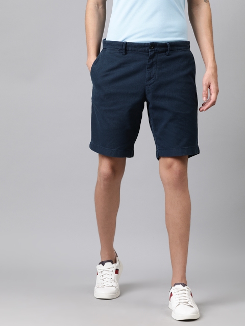 

Tommy Hilfiger Men Navy Blue Self Design Brooklyn Fit Regular Shorts