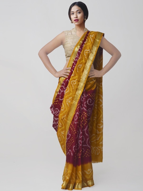 

Unnati Silks Maroon & Yellow Pure Silk Printed Bandhani Saree