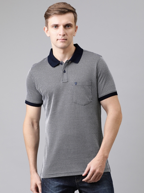 

Turtle Men Navy Blue & White Self Design Slim Fit Polo Collar T-shirt