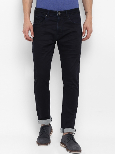 

SWISS MILITARY Men Navy Blue Tapered Fit Mid-Rise Clean Look Stretchable Jeans