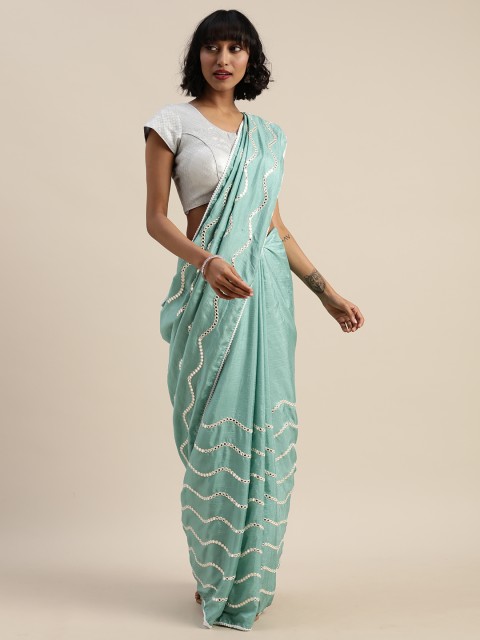 

Tikhi Imli Turquoise Blue Mirror Work Embroidered Poly Crepe Saree