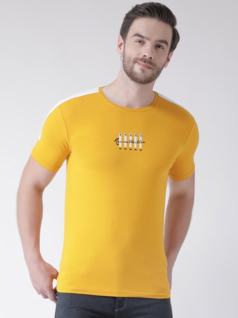 

Rex Straut Jeans Men Yellow Solid Round Neck T-shirt