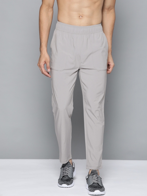 

HRX by Hrithik Roshan Men Wet Weather Grey Solid Regular Fit Rapid-Dry Running Track Pants