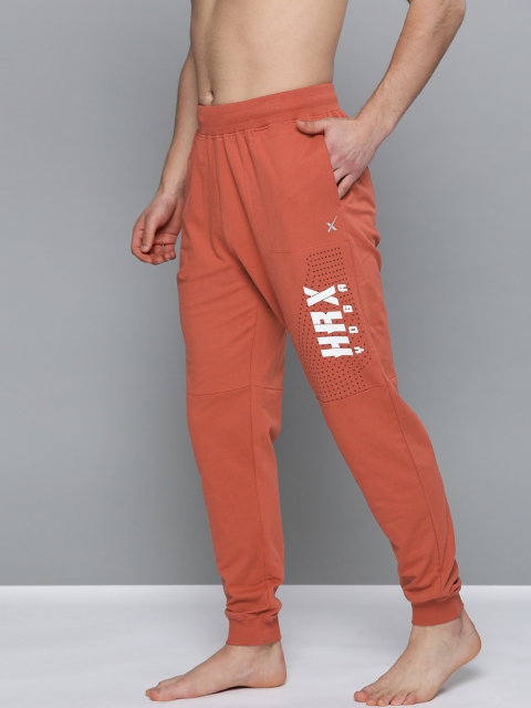 

HRX by Hrithik Roshan Men Tandoori Spice Regular Fit Bio-Wash Antimicrobial Yoga Joggers, Rust