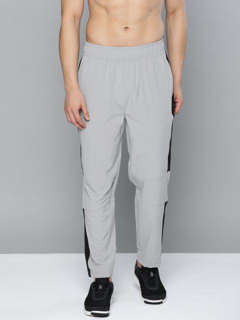 

HRX by Hrithik Roshan Men Wet Weather Solid Regular Fit Rapid-Dry Running Track Pants, Grey melange