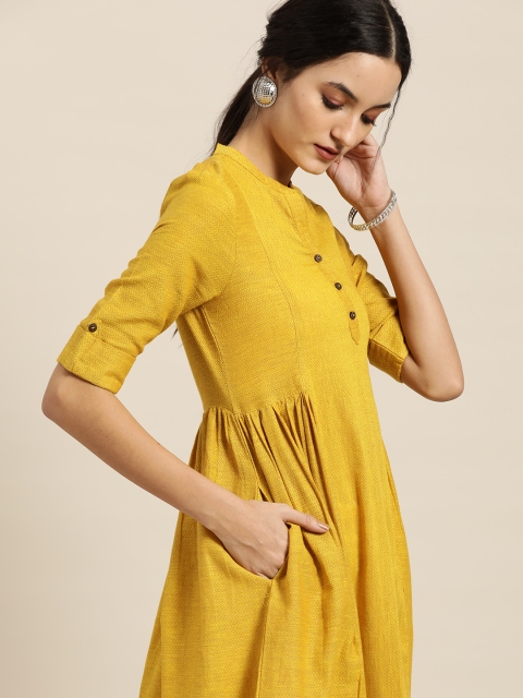 

Taavi Women Mustard Yellow Woven Legacy Chevron Patterned A-Line Kurta with Pockets