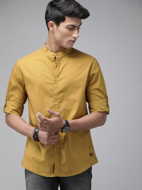 

Roadster Men Mustard Yellow Solid Shirt with Brand Logo Applique Detail