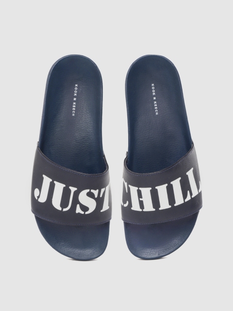 

Kook N Keech Men Navy Blue & White Typography Printed Sliders