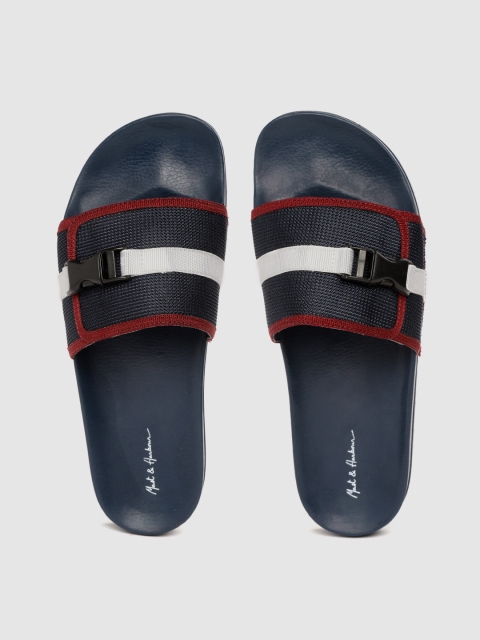 

Mast & Harbour Men Navy Blue & White Self Design Sliders