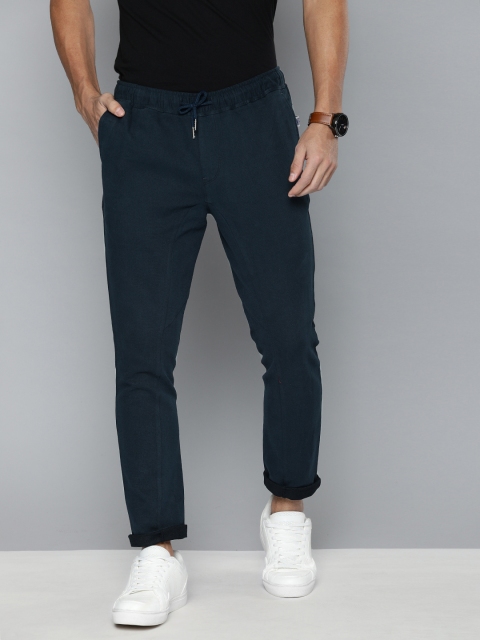 

Mast & Harbour Men Blue Solid Regular Trousers