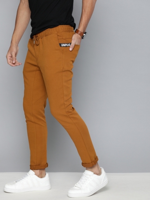 

Mast & Harbour Men Mustard Brown Solid Regular Trousers
