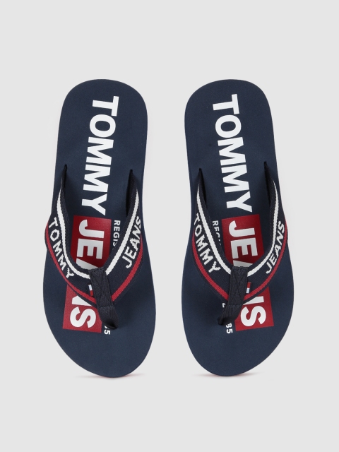 

Tommy Hilfiger Men Navy Blue & Red Solid Thong Flip-Flops