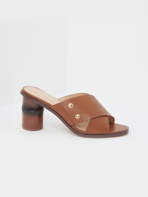 

shoexpress Women Brown Solid Heeled Mules