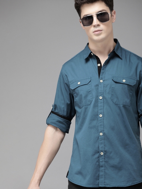 

Roadster Men Antiviral & Antibacterial protection Teal Regular Fit Solid Casual Shirt