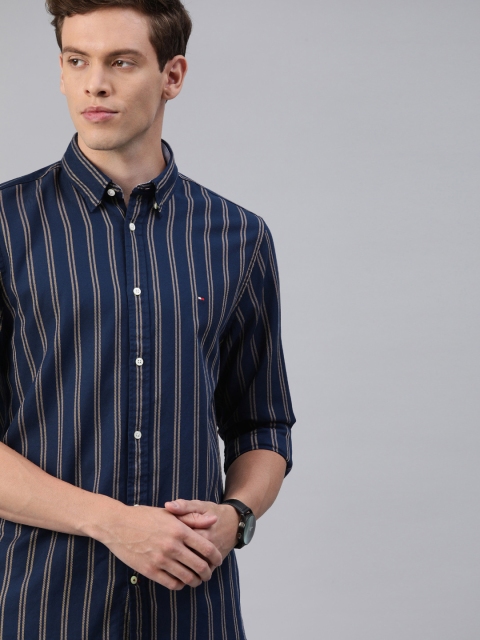 

Tommy Hilfiger Men Navy Blue & Beige Regular Fit Striped Casual Shirt