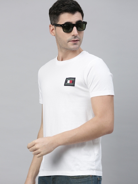 

Tommy Hilfiger Men White Solid Round Neck T-shirt with Applique Detail