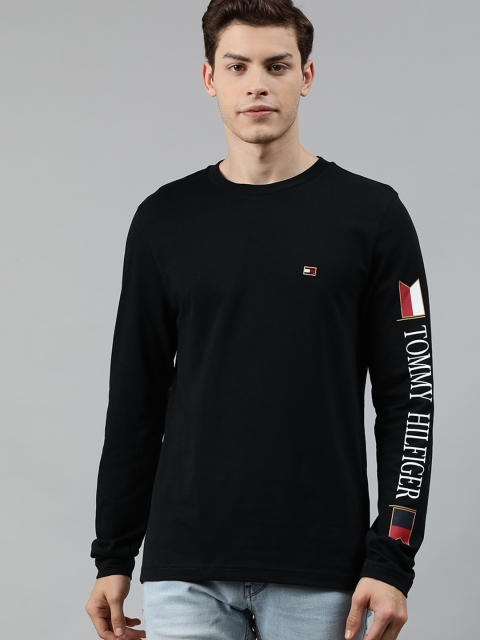 

Tommy Hilfiger Men Black Solid Round Neck T-shirt With Printed Detail on Sleeves