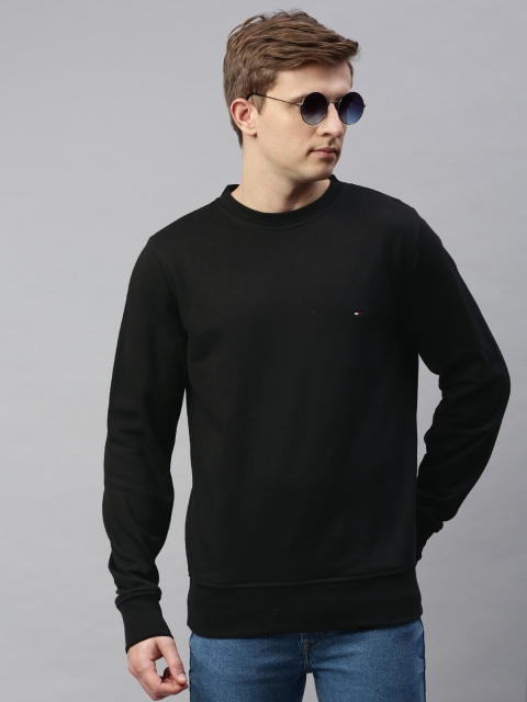 

Tommy Hilfiger Men Black Solid Sweatshirt