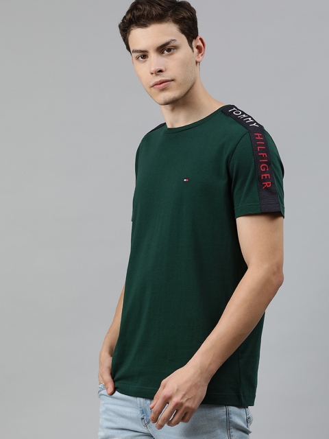 

Tommy Hilfiger Men Green Solid Round Neck T-shirt With Embroidered Detailing
