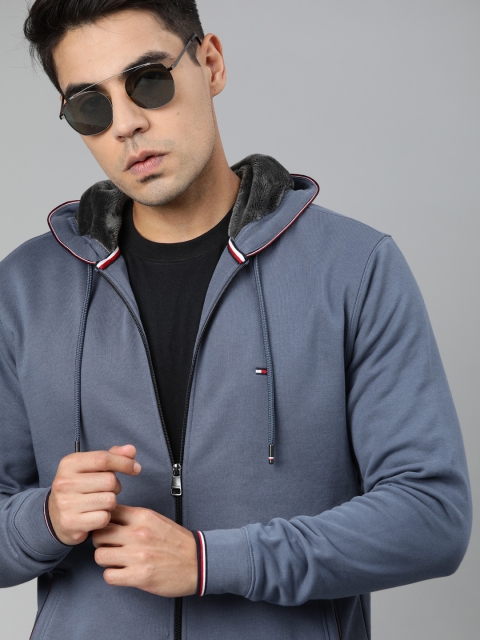 

Tommy Hilfiger Men Blue Solid Hooded Sweatshirt