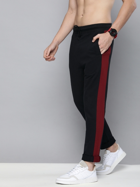 

HERE&NOW Men Black Solid Straight Fit Track Pants With Side Stripes