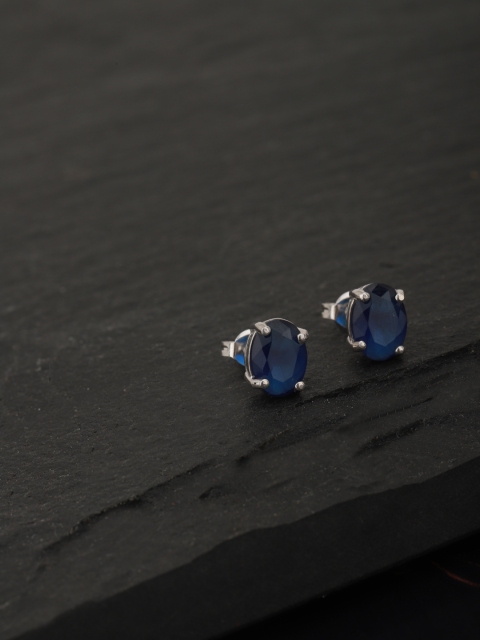 

Carlton London Silver-Toned & Navy Blue Artificial Stone Studded Rhodium-Plated Oval Studs