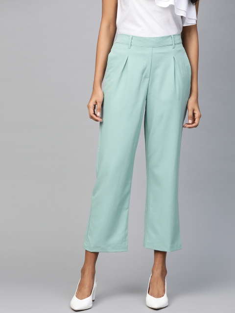 

ATRAENTA Women Green Solid Regular Trousers