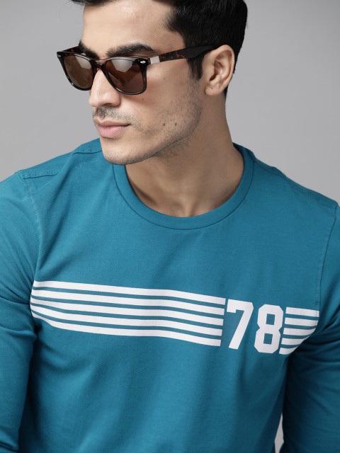 

Roadster Men Blue & White Striped Round Neck T-shirt with Printed Detail