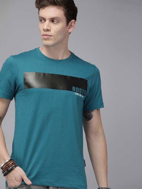 

Roadster Men Teal Blue & Black Striped Round Neck T-shirt