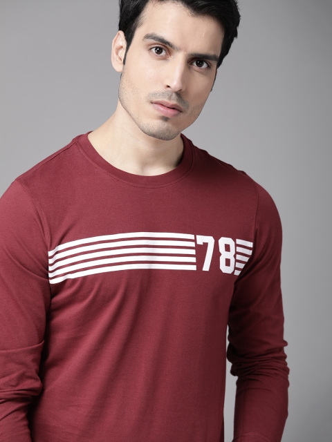 

Roadster Men Maroon Solid Round Neck T-shirt With Striped Detail
