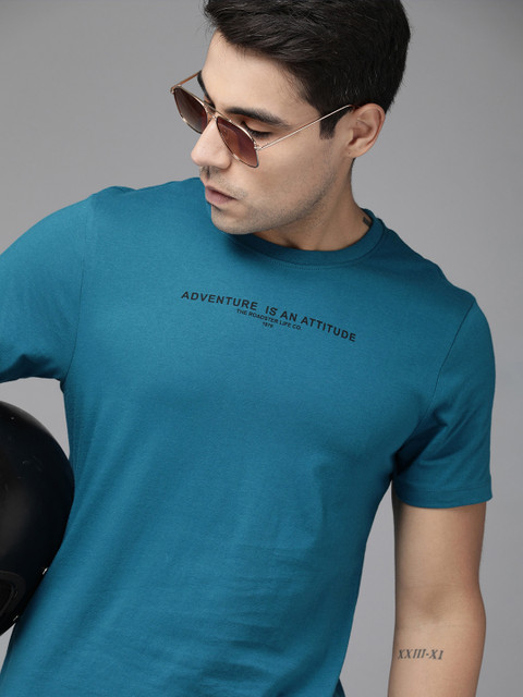 

Roadster Men Teal Printed Round Neck T-shirt
