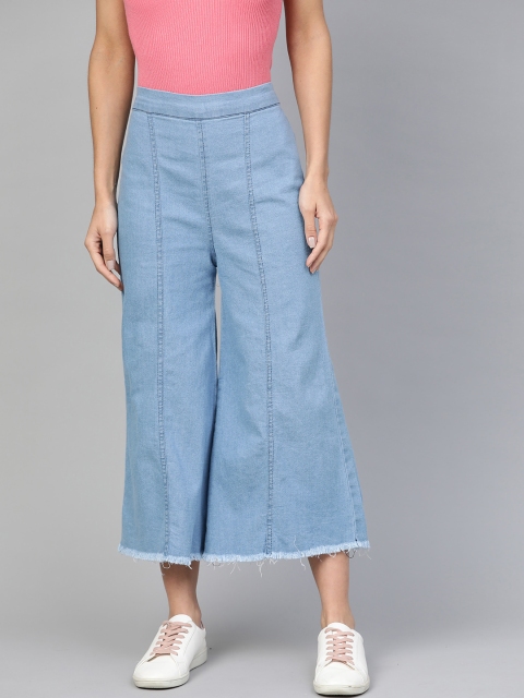 

Bhama Couture Women Blue Smart Loose Fit High Rise Denim Cropped Parallel Trousers