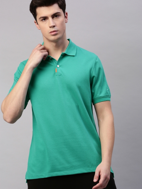 

Nike Men Sea Green Solid Polo Collar T-shirt