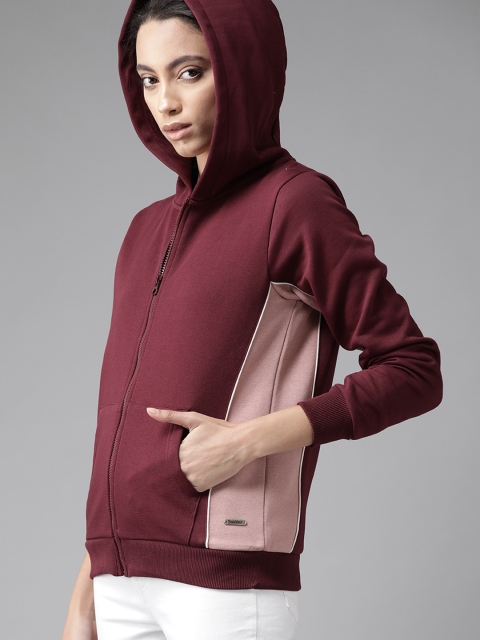 

Roadster Women Burgundy Solid Hooded Sweatshirt