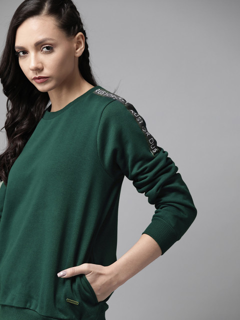 

Roadster Women Green Solid Sweatshirt
