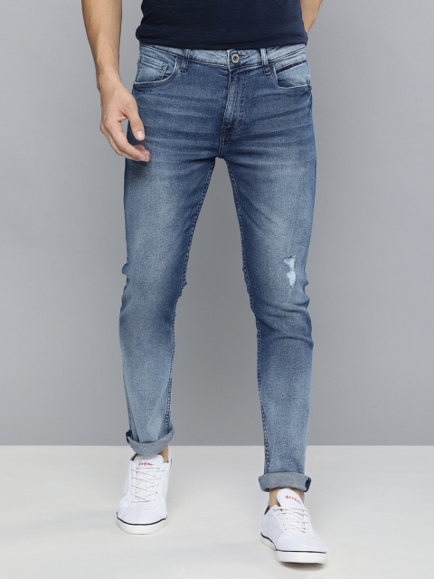 

Mast & Harbour Men Blue Skinny Fit Mid-Rise Low Distress Stretchable Jeans