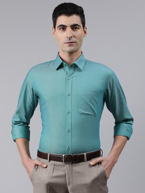 

Raymond Men Teal Green Regular Fit Solid Formal Shirt