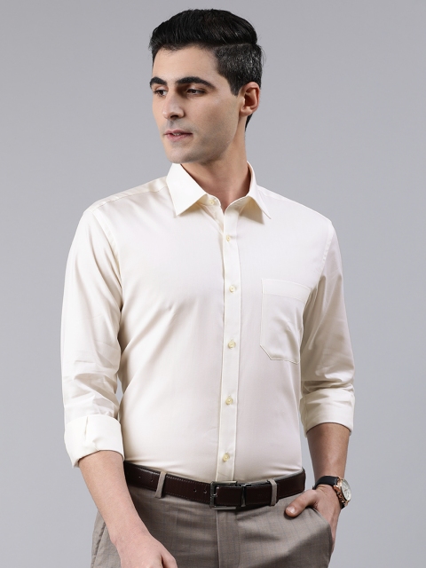 

Raymond Men Beige Regular Fit Solid Semiformal Shirt