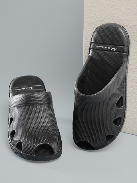 

Mast & Harbour Men Black Solid Slip-On