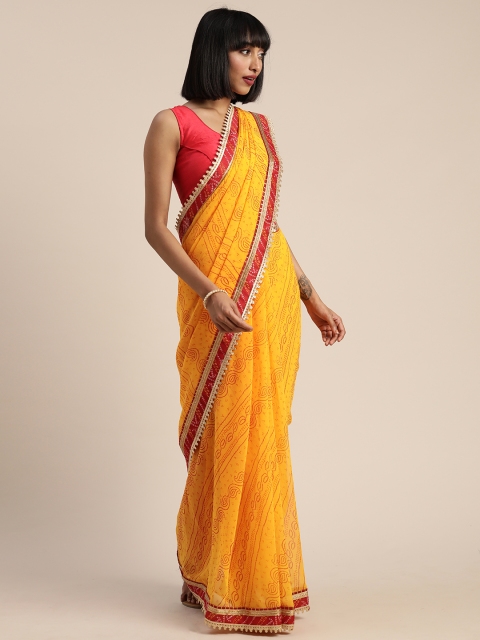 

Tikhi Imli Yellow & Red Poly Georgette Printed Bandhani Saree