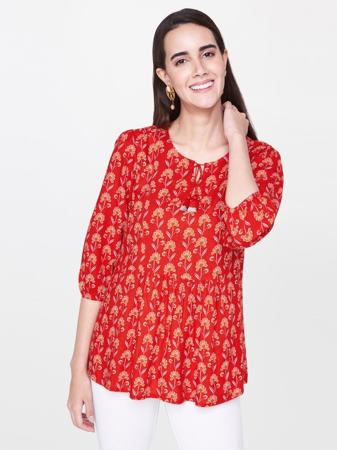 

Global Desi Women Red Floral Printed Tie-up Neck Puff Sleeves Regular Top