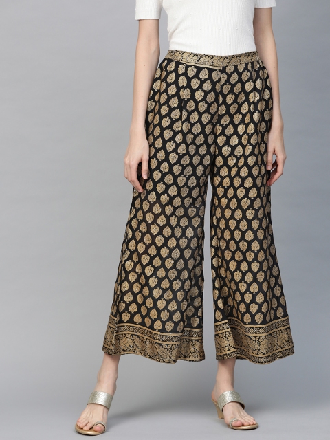 

Ahalyaa Women Black & Golden Ethnic Printed Cropped Wide Leg Palazzos