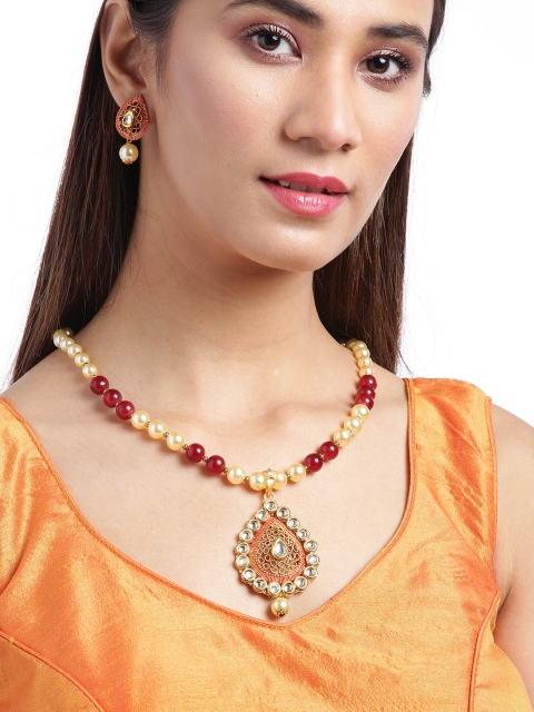 

Jewels Galaxy Maroon & Off-White Gold-Plated Stone-Studded & Beaded Jewellery Set