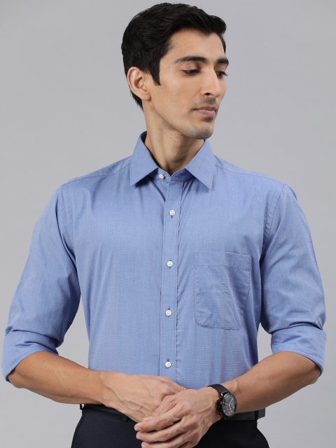 

Raymond Men Blue Slim Fit Solid Formal Shirt