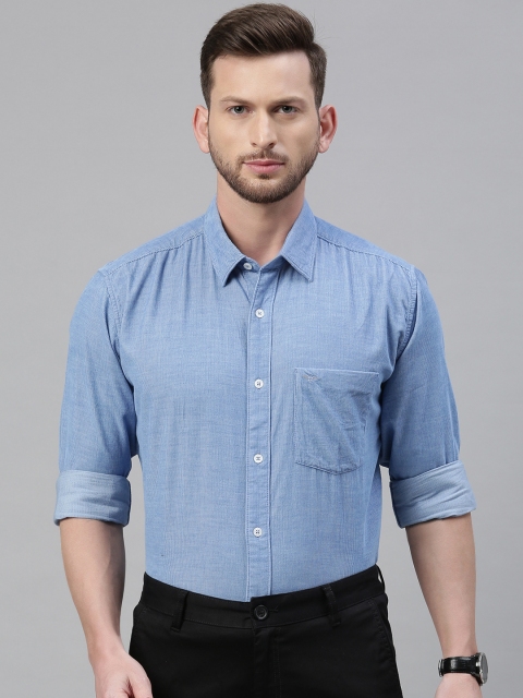 

Park Avenue Men Blue Solid Slim Fit Formal Shirt