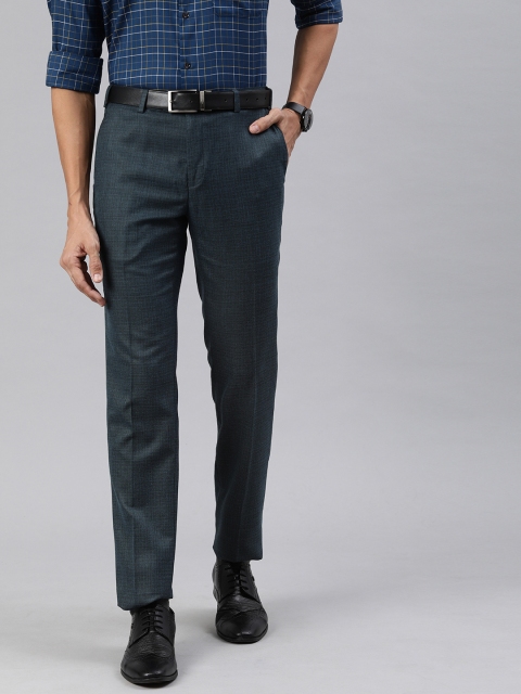 

Raymond Men Navy Blue Slim Fit Self Design Regular Trousers