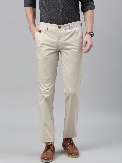 

Park Avenue Men Beige Tapered Fit Solid Chinos